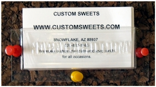 TAKE A CARD card holder with Custom Sweets cards in them.